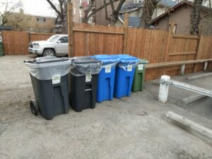 Green Planet Recycling row of garbage bins