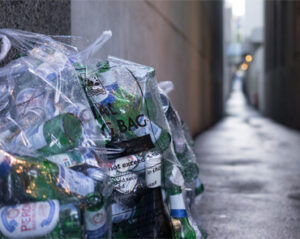 A bag of garbage waiting to be recycled by Green Planet Organic Reycling